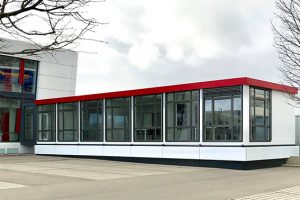 Container-Anbau an bestehendes Gebäude